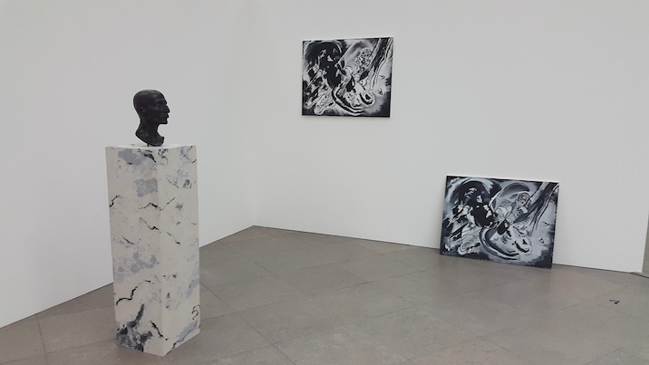 The bronze cast of Jewish artist Max Liebermann’s death mask produced by Nazi sculptor Arno Breker, displayed on a base produced by Deball beside two of her paintings. Taken with the Samsung Galaxy Alpha.