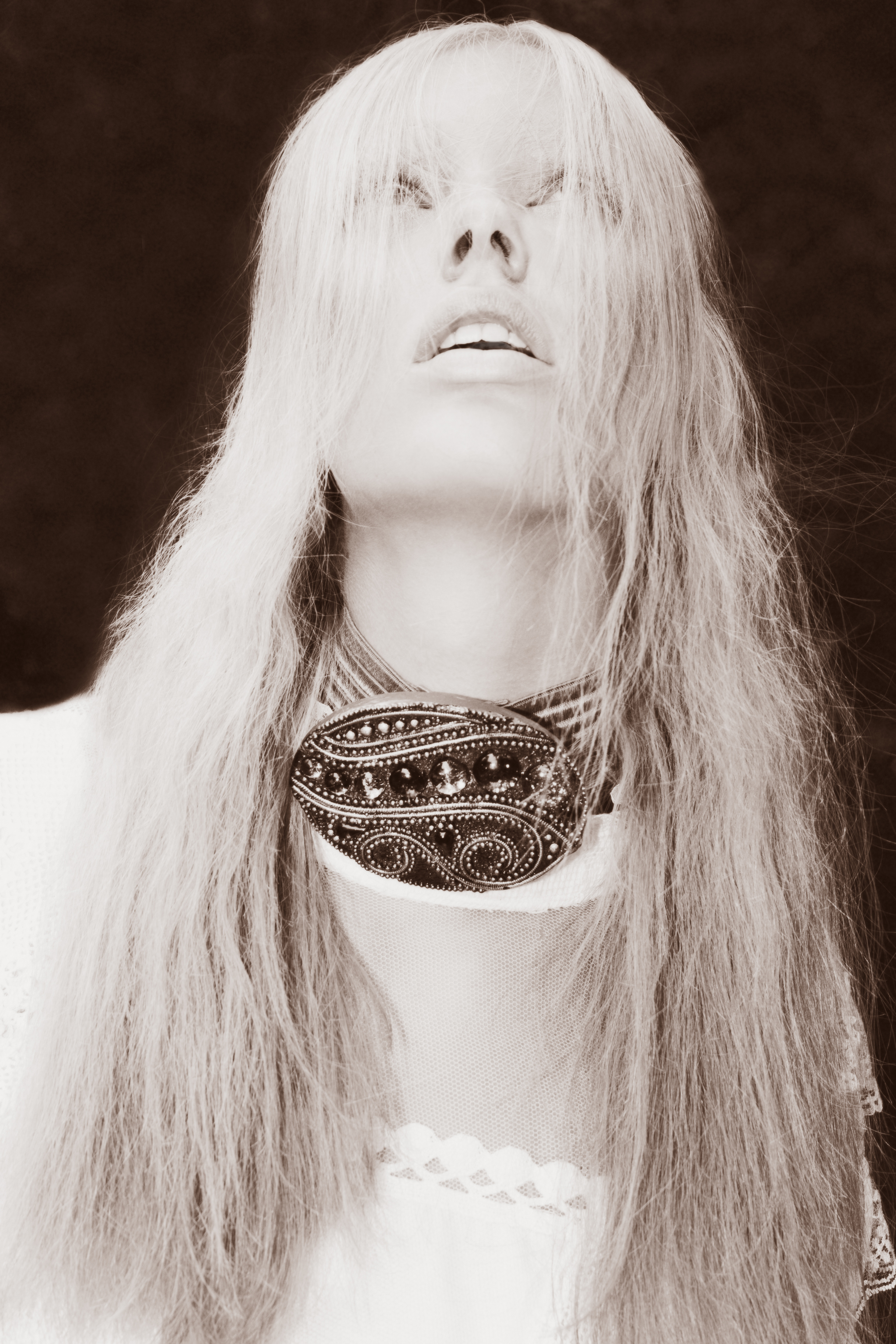 Belt around neck: Stylist own, top: Vivienne Westwood